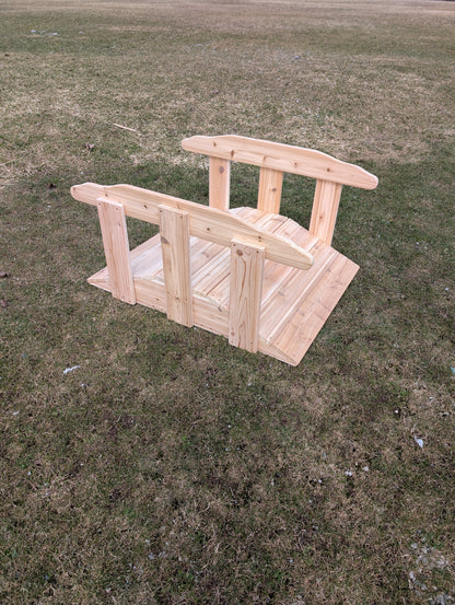 Cedar outdoor ramp with handrails for climbing and active play